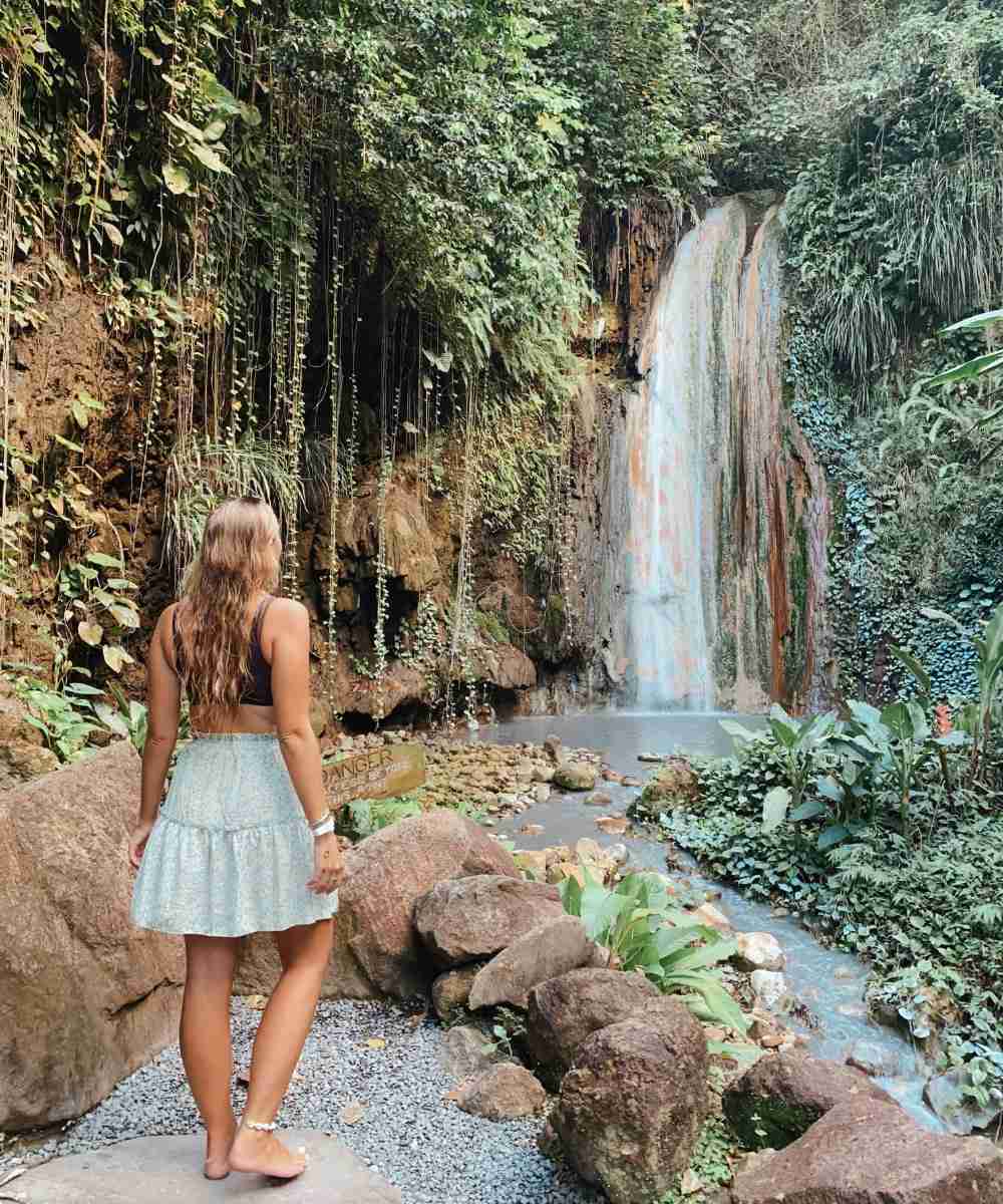 Looking at rainbow waterfall in St Lucia located at Diamond Falls & Botanical Gardens