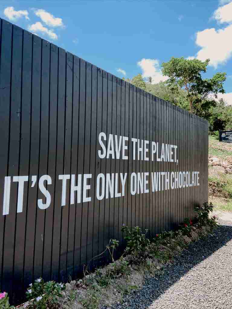 welcome sign at tree to bar experience hotel chocolat rabot estate in st lucia