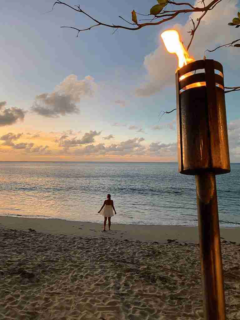 woman on cap estate smugglers cove beach at sunset